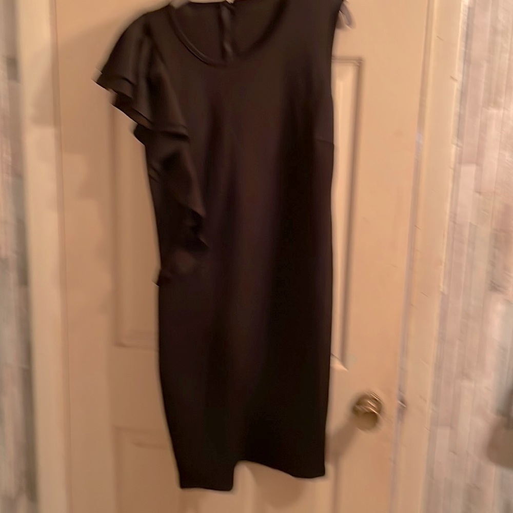 X large body con one sleeve dress with the other sleeve has ruffle down to waist